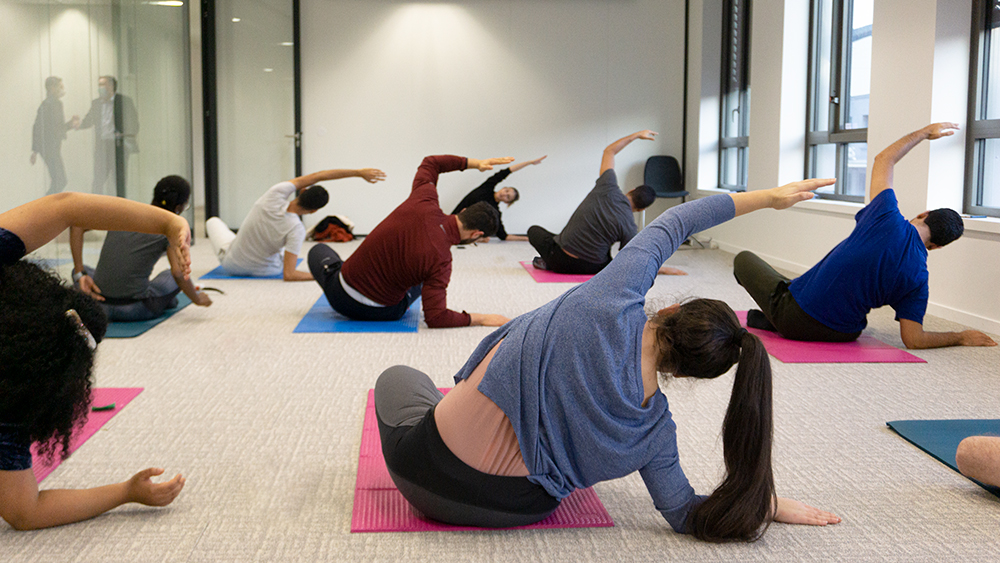 Students practicing yoga